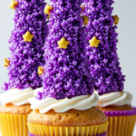 Wizard hat cupcakes with purple frosting, gold star decorations, and sugar cone hats, displayed on a dessert table